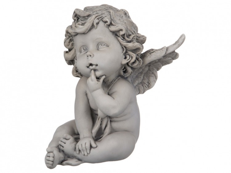 Фигура ангела дома - символ духовности и благочестия, который наполняет пространство теплом и любовью